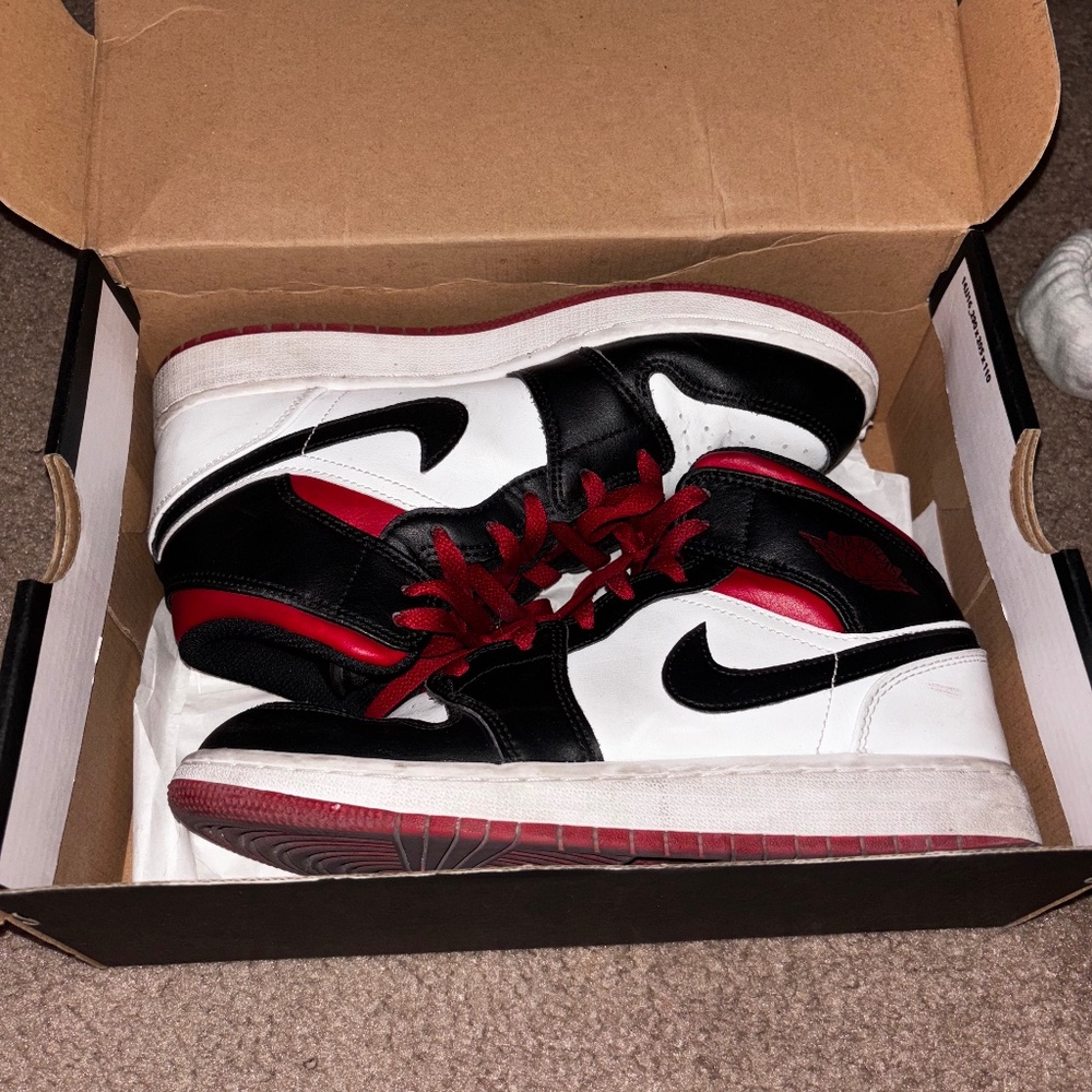 Red Jordan 1s